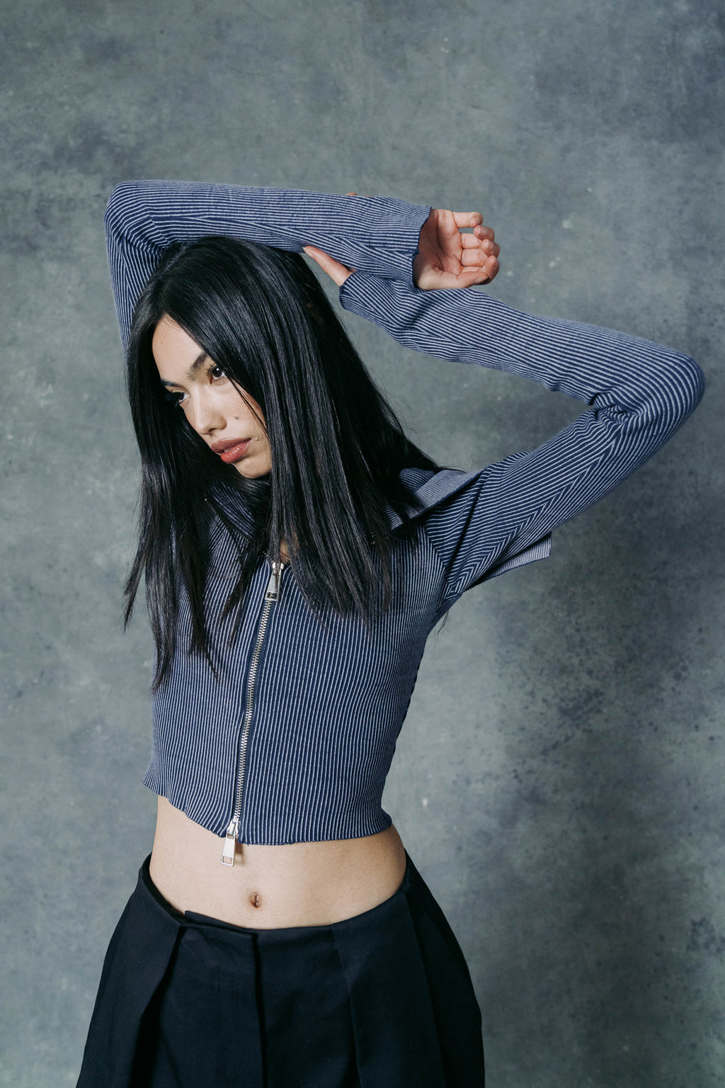 THE SCULPTED ZIP TOP